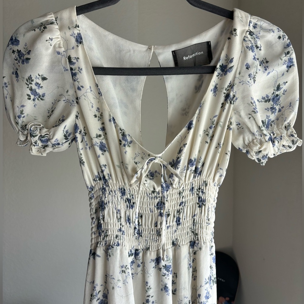White and blue floral mini dress. In amazing condition. Never worn.